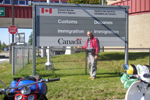 Klaus at the Canadian border sign.